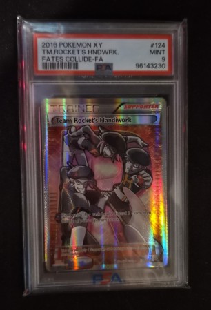 Team Rocket's Handiwork 124/124 - PSA 9